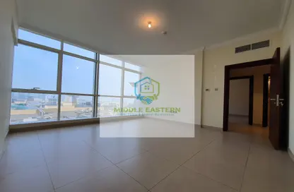 Empty Room image for: Apartment - 1 Bedroom - 2 Bathrooms for rent in Al Wahda Street - Al Wahda - Abu Dhabi, Image 1