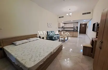 Apartment - Studio - 1 Bathroom for rent in Chaimaa Premiere - Jumeirah Village Circle - Dubai