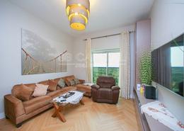 Living Room image for: Apartment - 1 bedroom - 2 bathrooms for rent in Global Golf Residences 2 - Dubai Sports City - Dubai, Image 1