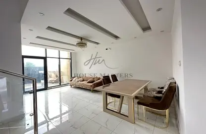 Living / Dining Room image for: Townhouse - 5 Bedrooms - 5 Bathrooms for rent in Al Aamra Gardens - Al Amerah - Ajman, Image 1