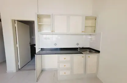 Kitchen image for: Apartment - 1 Bathroom for rent in Fire Station Road - Muwaileh - Sharjah, Image 1