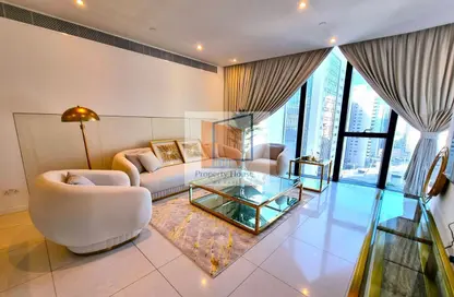 Living Room image for: Apartment - 2 Bedrooms - 3 Bathrooms for rent in Burj Mohammed Bin Rashid at WTC - Corniche Road - Abu Dhabi, Image 1