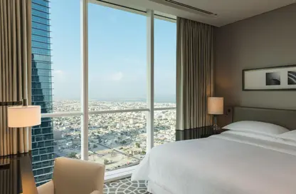 صورة لـ غرفة- غرفة النوم شقة - غرفة نوم - 2 حمامات للايجار في فندق شيراتون الكبير - شارع الشيخ زايد - دبي ، صورة رقم 1