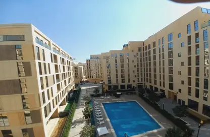 Pool image for: Apartment - 1 Bathroom for rent in Souks Residential - Al Mamsha - Muwaileh - Sharjah, Image 1