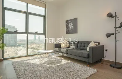 Living Room image for: Apartment - 1 Bedroom - 1 Bathroom for rent in AKA Residence - Jumeirah Village Circle - Dubai, Image 1