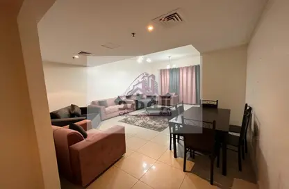 Living / Dining Room image for: Apartment - 2 Bedrooms - 3 Bathrooms for rent in Sonya Tower - Sheikh Khalifa Bin Zayed Street - Ajman, Image 1