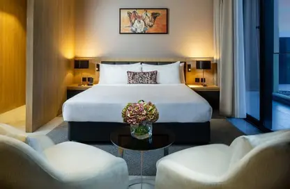 صورة لـ غرفة- غرفة النوم النزل و الشقق الفندقية - غرفة نوم - 2 حمامات للايجار في مردف - دبي ، صورة رقم 1