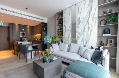 Living / Dining Room image for: Apartment - 1 Bedroom - 2 Bathrooms for sale in Oxford Gardens - Arjan - Dubai, Image 1