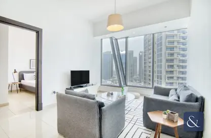 Living Room image for: Apartment - 1 Bedroom - 2 Bathrooms for sale in Silverene Tower B - Silverene - Dubai Marina - Dubai, Image 1