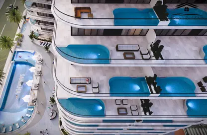 Pool image for: Apartment - 2 Bedrooms - 3 Bathrooms for sale in Samana Portofino - Dubai Production City (IMPZ) - Dubai, Image 1