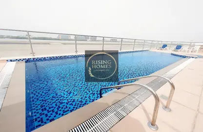 صورة لـ حوض سباحة شقة - 2 غرف نوم - 3 حمامات للايجار في النيم ريسيدينس - روضة أبو ظبي - أبوظبي ، صورة رقم 1