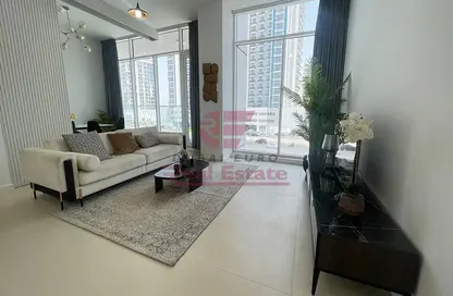 Living Room image for: Apartment - 1 Bedroom - 2 Bathrooms for sale in PG Upperhouse - Al Furjan - Dubai, Image 1