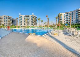 Pool image for: Apartment - 1 bedroom - 2 bathrooms for sale in MAG 530 - Mag 5 Boulevard - Dubai South (Dubai World Central) - Dubai, Image 1