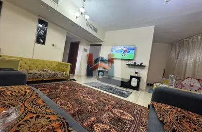شقة - غرفة نوم - 2 حمامات للبيع في أورينت تاور 1 - أورينت تاور - البستان - عجمان