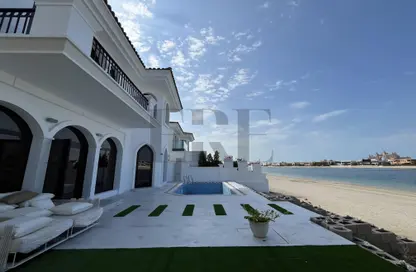Outdoor Building image for: Villa - 4 Bedrooms - 5 Bathrooms for rent in Garden Homes Frond E - Garden Homes - Palm Jumeirah - Dubai, Image 1