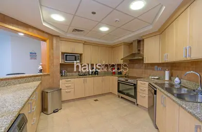 Kitchen image for: Apartment - 3 Bedrooms - 4 Bathrooms for rent in Al Khushkar - Shoreline Apartments - Palm Jumeirah - Dubai, Image 1
