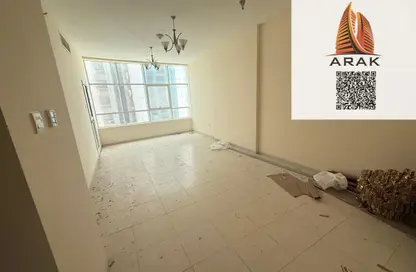 شقة - غرفة نوم - 2 حمامات للايجار في أورينت تاور 1 - أورينت تاور - البستان - عجمان