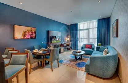 صورة لـ غرفة المعيشة / غرفة الطعام شقة - غرفة نوم - 2 حمامات للايجار في رويال كونتيننتال سويتس - الخليج التجاري - دبي ، صورة رقم 1