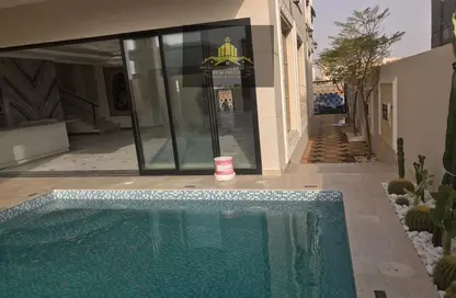 Pool image for: Villa - 5 Bedrooms - 7 Bathrooms for sale in Ajman Hills - Al Alia - Ajman, Image 1
