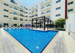 Pool image for: Apartment - 2 bedrooms - 3 bathrooms for rent in Park Square - Jumeirah Village Circle - Dubai, Image 1
