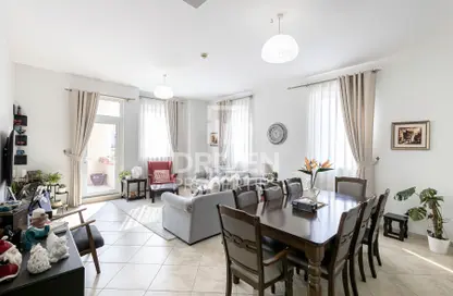 Living / Dining Room image for: Apartment - 3 Bedrooms - 3 Bathrooms for sale in Bennett House 2 - Bennett House - Motor City - Dubai, Image 1