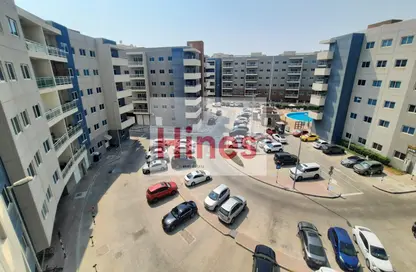 Outdoor Building image for: Apartment - 1 Bedroom - 2 Bathrooms for sale in Tower 4 - Al Reef Downtown - Al Reef - Abu Dhabi, Image 1