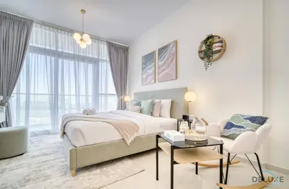 Room / Bedroom image for: Apartment - 1 Bathroom for rent in Carson - DAMAC Hills - Dubai, Image 1