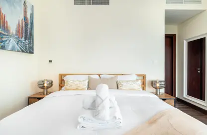 صورة لـ غرفة- غرفة النوم شقة - غرفة نوم - 2 حمامات للايجار في شيخ محمد بن راشد بوليفار - دبي وسط المدينة - دبي ، صورة رقم 1