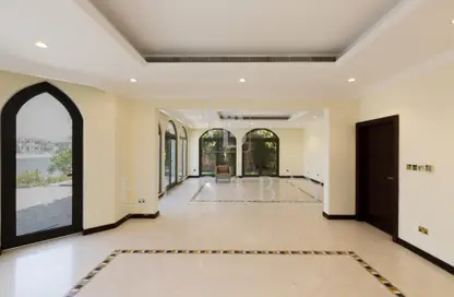 Villa - 4 Bedrooms - 6 Bathrooms for rent in Garden Homes Frond B - Garden Homes - Palm Jumeirah - Dubai