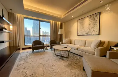 Living Room image for: Apartment - 1 Bedroom - 2 Bathrooms for rent in Burj Lake Hotel - The Address DownTown - Downtown Dubai - Dubai, Image 1