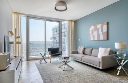 Living Room image for: Apartment - 3 Bedrooms - 3 Bathrooms for rent in 1 Residences - Wasl1 - Al Kifaf - Dubai, Image 1