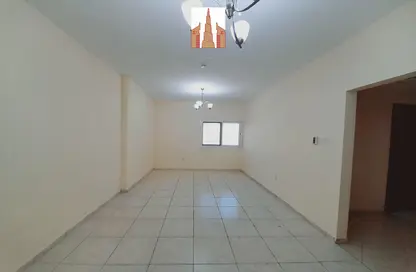 Empty Room image for: Apartment - 2 Bedrooms - 3 Bathrooms for rent in Al Zain Tower - Al Nahda - Sharjah, Image 1