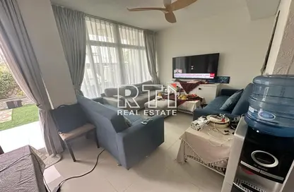 Living Room image for: Townhouse - 3 Bedrooms - 3 Bathrooms for sale in Albizia - Damac Hills 2 - Dubai, Image 1
