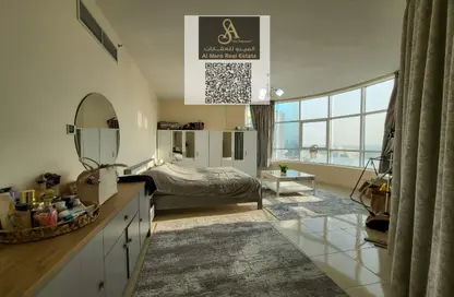 شقة - غرفة نوم - 2 حمامات للبيع في أورينت تاور 1 - أورينت تاور - البستان - عجمان