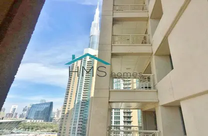 Outdoor Building image for: Apartment - 1 Bedroom - 2 Bathrooms for rent in 29 Burj Boulevard Tower 1 - 29 Burj Boulevard - Downtown Dubai - Dubai, Image 1