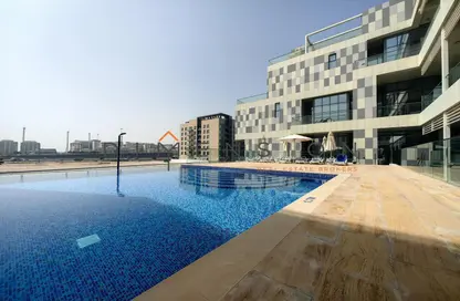Pool image for: Duplex - 2 Bedrooms - 3 Bathrooms for rent in Al Raha Lofts - Al Raha Beach - Abu Dhabi, Image 1
