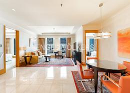 Living / Dining Room image for: Hotel and Hotel Apartment - 2 bedrooms - 2 bathrooms for rent in Ritz Carlton - DIFC - Dubai, Image 1