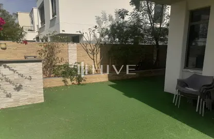 Garden image for: Villa - 4 Bedrooms - 4 Bathrooms for rent in Hayat Townhouses - Town Square - Dubai, Image 1