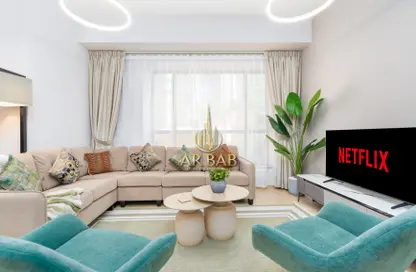 Living Room image for: Apartment - 1 Bedroom - 1 Bathroom for rent in Bahar 6 - Bahar - Jumeirah Beach Residence - Dubai, Image 1