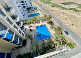 صورةحوض سباحة لـ: شقة - 2 غرف نوم - 3 حمامات للبيع في 2 افينيو ريزدنس - افينيو ريزدنس - الفرجان - دبي, صورة 1
