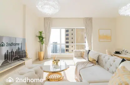 Living Room image for: Apartment - 2 Bedrooms - 3 Bathrooms for rent in Shams 1 - Shams - Jumeirah Beach Residence - Dubai, Image 1