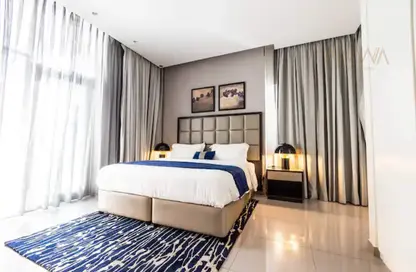صورة لـ غرفة- غرفة النوم شقة - غرفة نوم - 2 حمامات للايجار في داماك ماجستين - الخليج التجاري - دبي ، صورة رقم 1