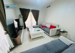 Living Room image for: Apartment - 1 bedroom - 2 bathrooms for rent in Golf Apartments - Al Hamra Village - Ras Al Khaimah, Image 1