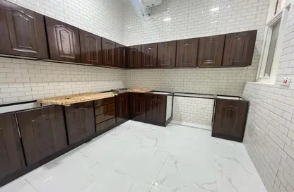 Kitchen image for: Villa - 2 Bedrooms - 3 Bathrooms for rent in Mohamed Bin Zayed Centre - Mohamed Bin Zayed City - Abu Dhabi, Image 1