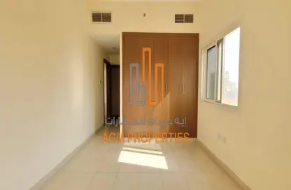Room / Bedroom image for: Apartment - 2 Bedrooms - 3 Bathrooms for rent in Sunrise Building - Dubai Silicon Oasis - Dubai, Image 1