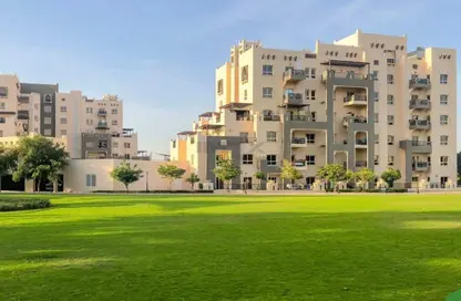 Outdoor Building image for: Apartment - 2 Bedrooms - 2 Bathrooms for sale in Al Thamam - Remraam - Dubai, Image 1