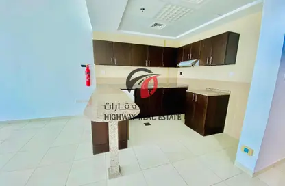 شقة - غرفة نوم - 2 حمامات للايجار في برج ربيعة - مجان - دبي لاند - دبي