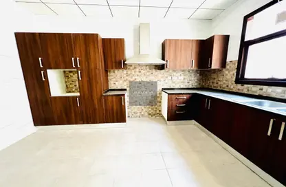 Kitchen image for: Villa - 5 Bedrooms - 5 Bathrooms for rent in Muroor Area - Abu Dhabi, Image 1