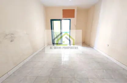 Empty Room image for: Apartment - 1 Bedroom - 1 Bathroom for rent in Al Mamzar Plaza - Al Taawun Street - Al Taawun - Sharjah, Image 1
