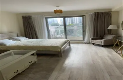 Room / Bedroom image for: Apartment - 1 Bathroom for sale in Boulevard Central Towers - Downtown Dubai - Dubai, Image 1